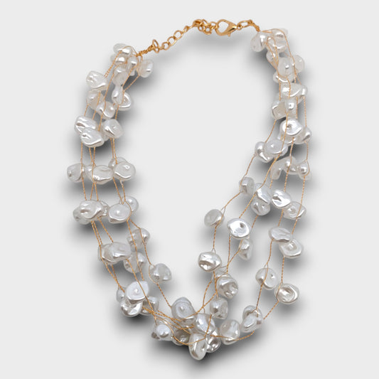 Collana "Perla Libera" – fili trasparenti con perle irregolari